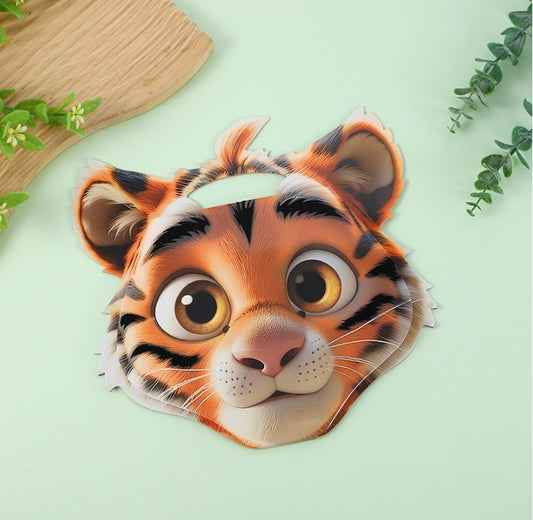 Tiger-themed eye mask on a light green background with leaves